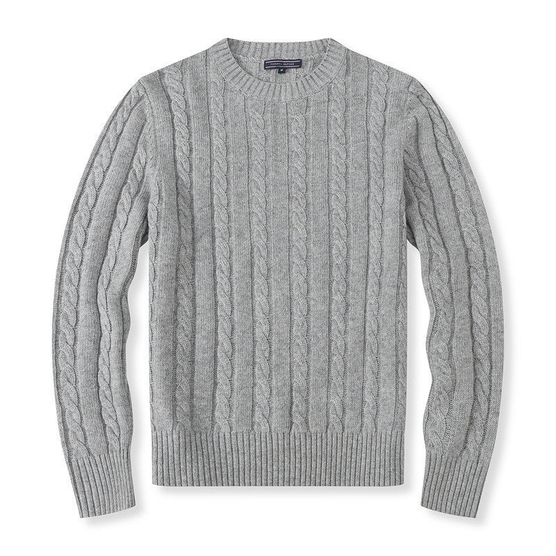 Gray cable knit sweater on a white background